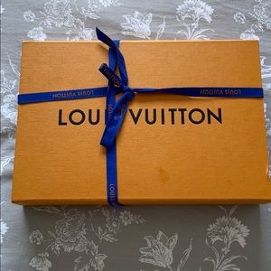 Louis Vuitton dust box with ribbon